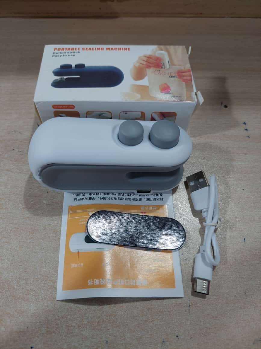 2025_12_27_2abd6c9d97f5d964327f9a88ac80140f (5) 1 Pc Mini Heat Sealing Machine 2-In-1 Cutter & Sealer With USB Cable – Compact USB Rechargeable Food Bag Sealer For Snacks And Storage (Random Color) - Image 3